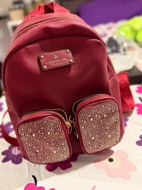 London Fog Women's Red Backpack with Embellished Front Pockets